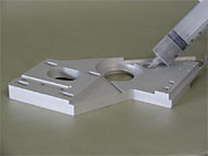 Injecting Technon (tm) / poly compound